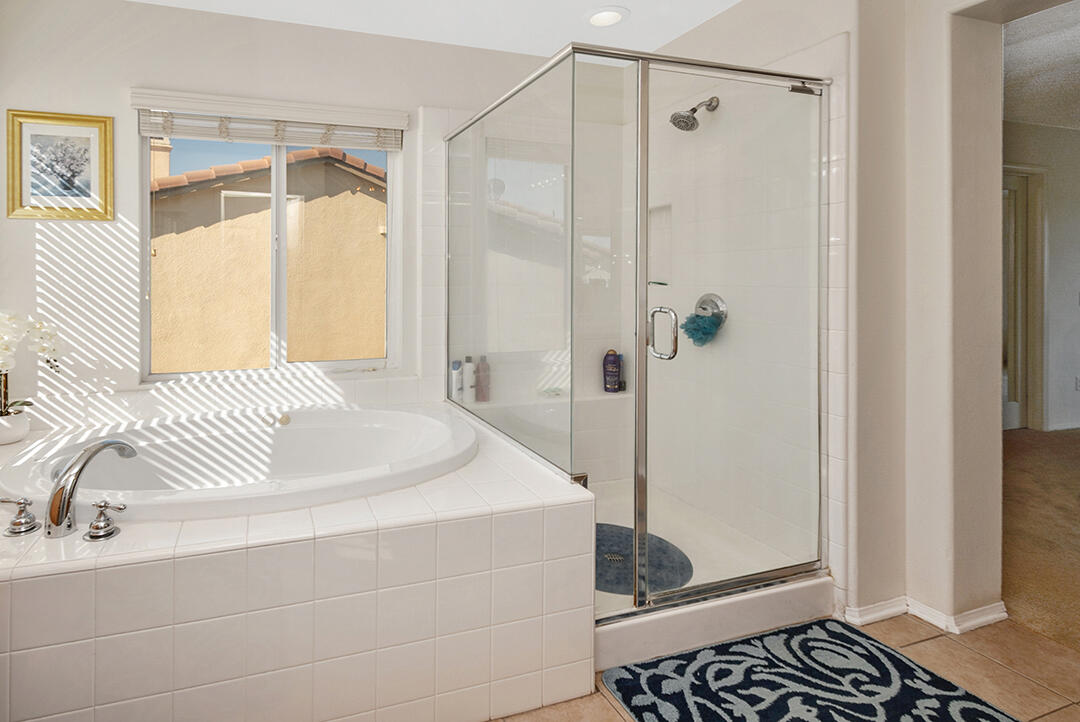 28938 Mirada Circulo Valencia, CA 91354 - Photo 32 of 56 a bathroom with a shower and a sink