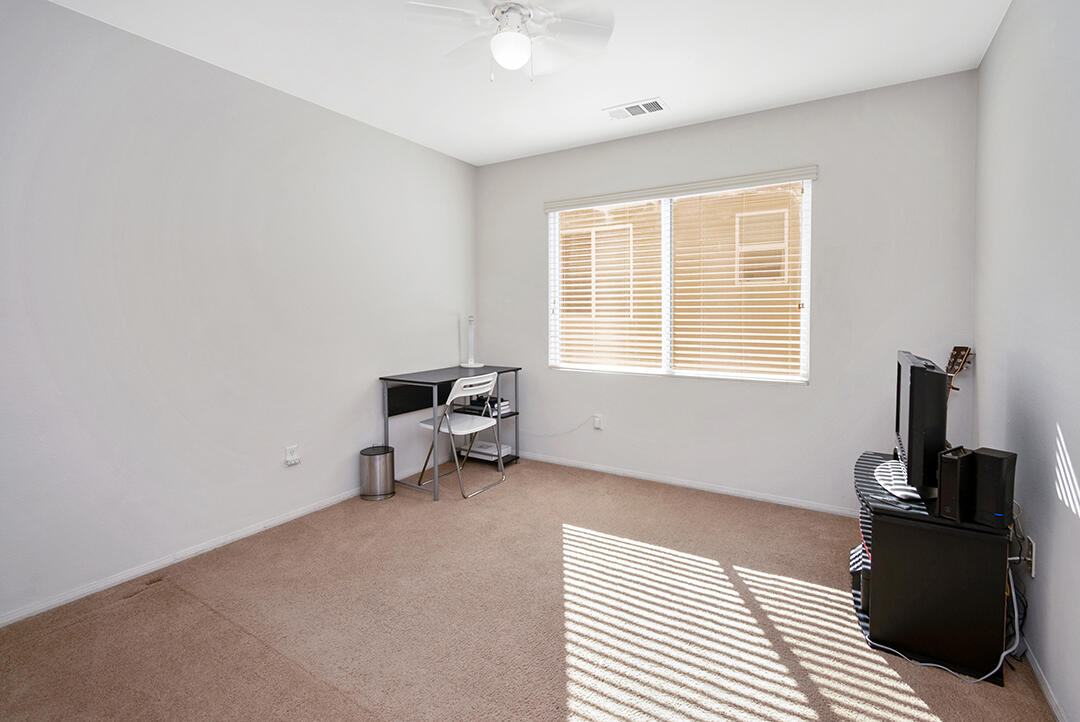 28938 Mirada Circulo Valencia, CA 91354 - Photo 34 of 56 a room with a bed and wooden floor