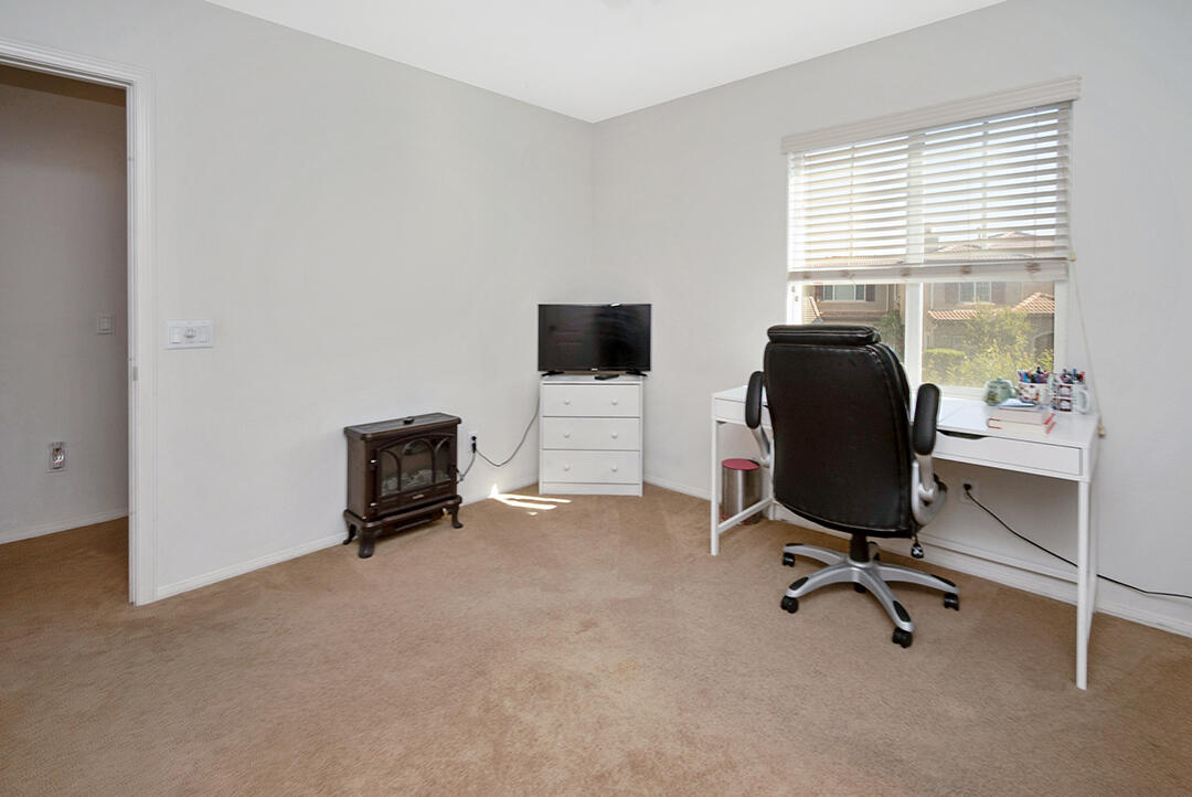 28938 Mirada Circulo Valencia, CA 91354 - Photo 38 of 56 a view of a workspace with furniture and a window