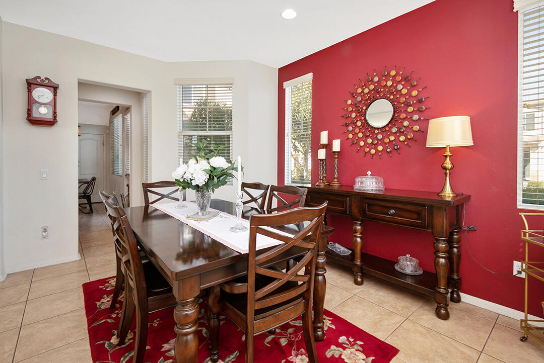 28938 Mirada Circulo Valencia, CA 91354 - Photo 5 of 56 a dining room with furniture and a window
