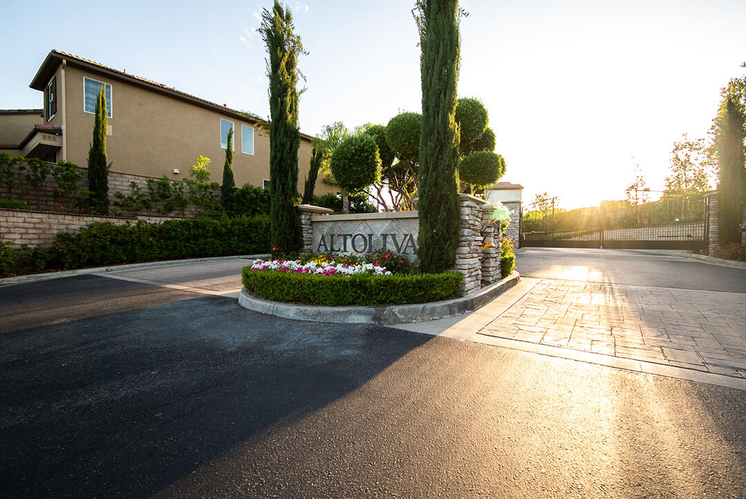 28938 Mirada Circulo Valencia, CA 91354 - Photo 46 of 56 a view of a street with a small yard