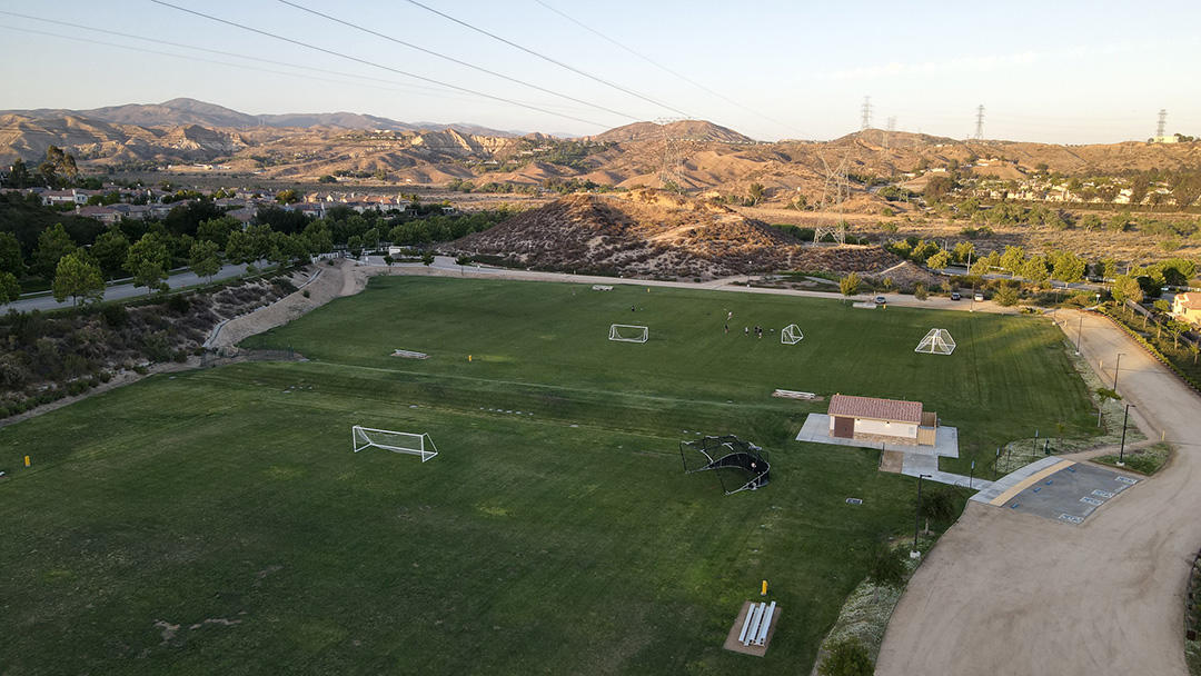 28938 Mirada Circulo Valencia, CA 91354 - Photo 55 of 56 an aerial view of a city with lots of residential buildings ocean and mountain view in back