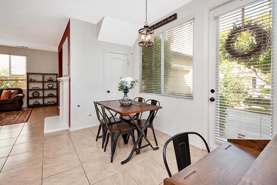 28938 Mirada Circulo Valencia, CA 91354 - Photo 10 of 56 a view of a dining room with furniture and a window