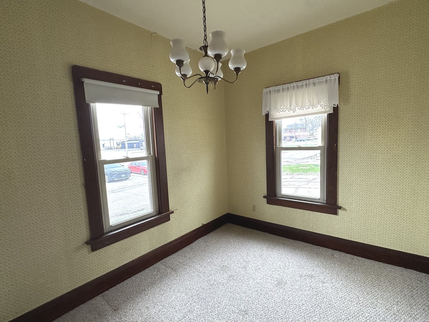 303 South Pleasant Street Princeton, IL 61356 - Photo 14 of 20 a view of a livingroom with a chandelier