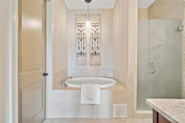 a bathroom with a shower and a sink