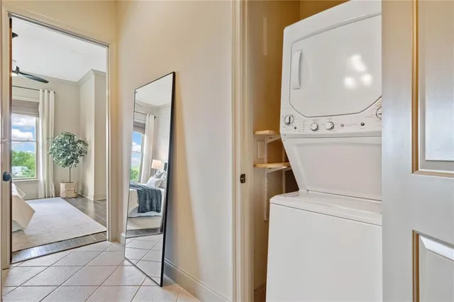 a view of a hallway with washer and dryer
