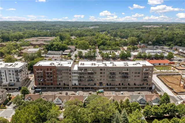 a view of a city with lots of green space