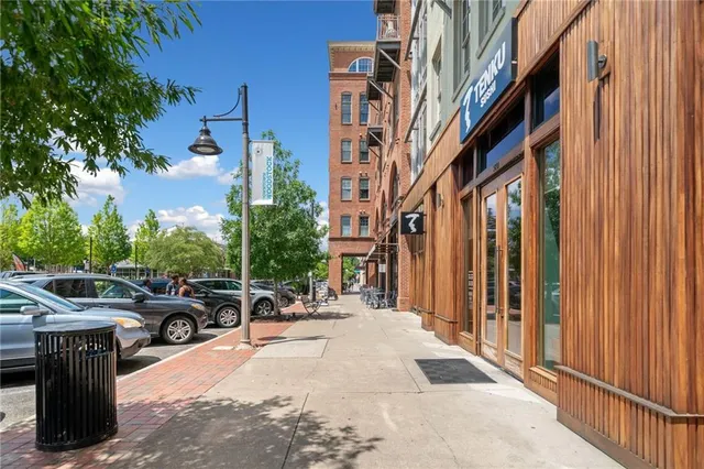 a sign that is sitting on a wooden floor