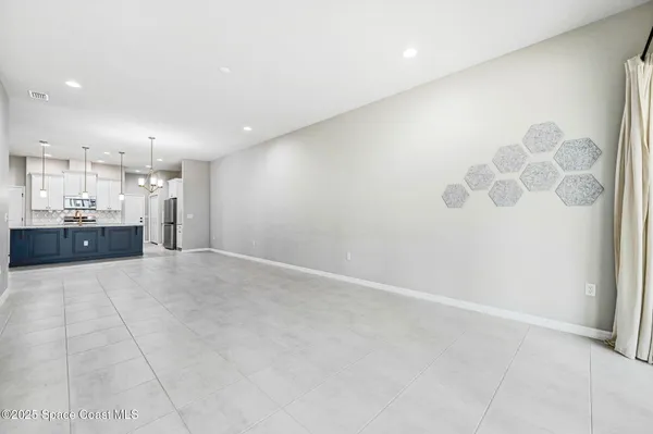 a kitchen with appliances cabinets and a counter top space