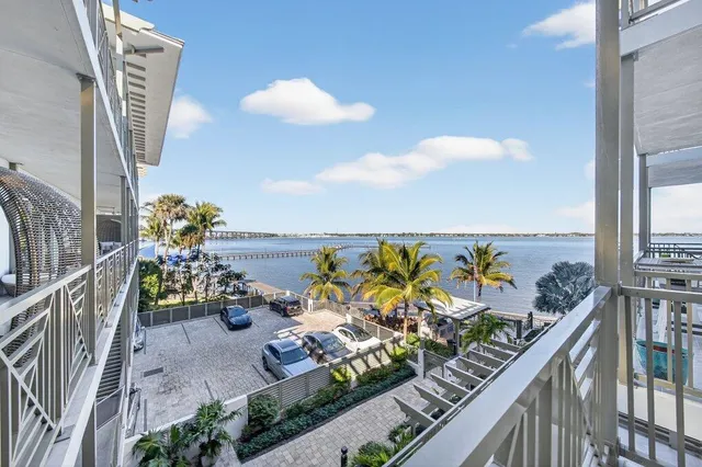 swimming pool view with couple of flower plants