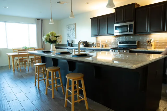 a bathroom with a shower and a sink
