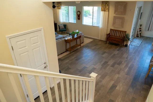 a bedroom with a bed and a television