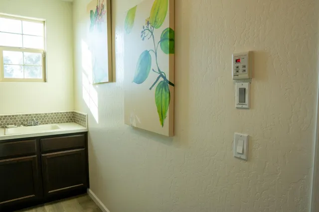 a view of a livingroom with furniture and window