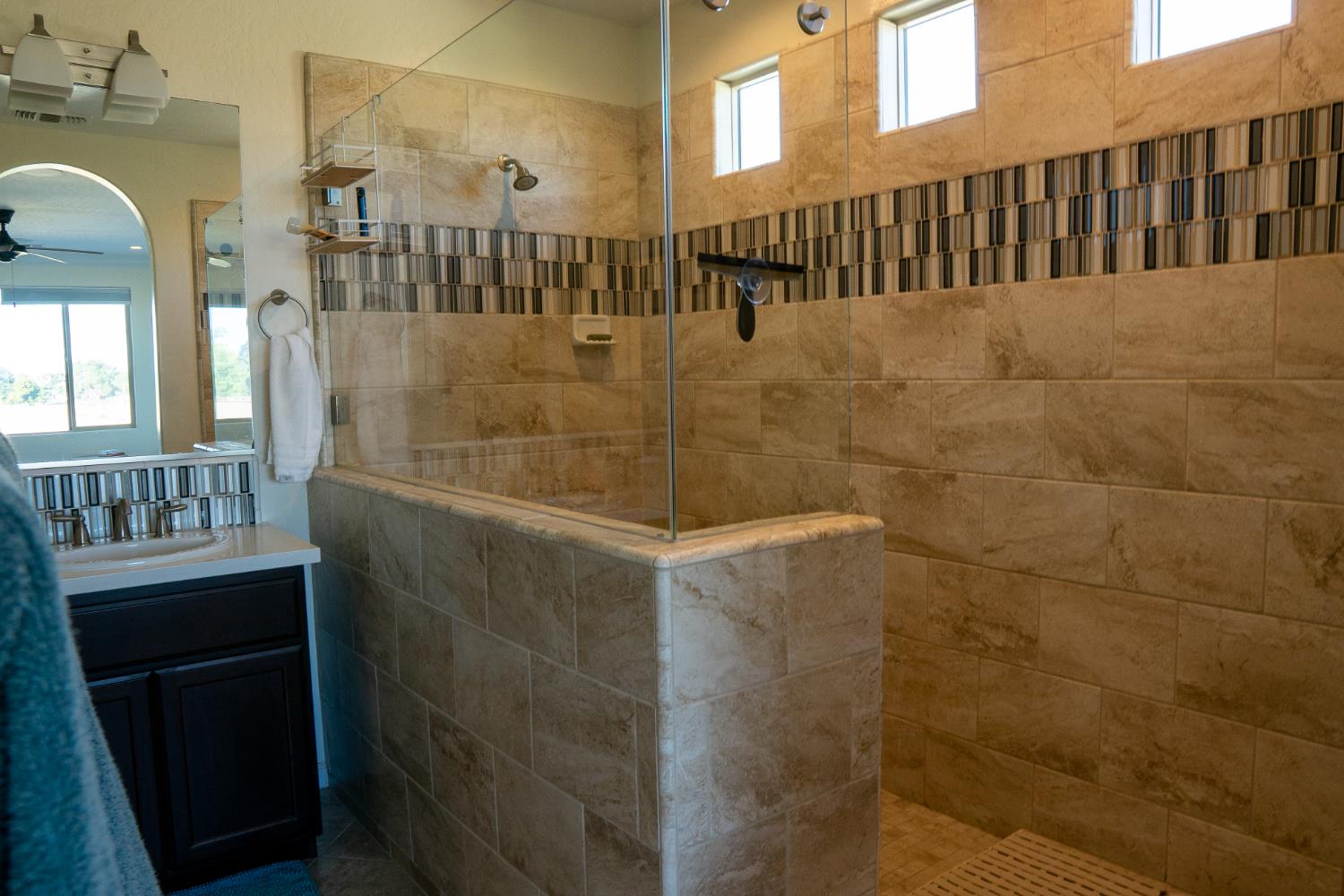 470 Daphne Lane Lemoore, CA 93245 - Photo 45 of 86 a bathroom with a shower