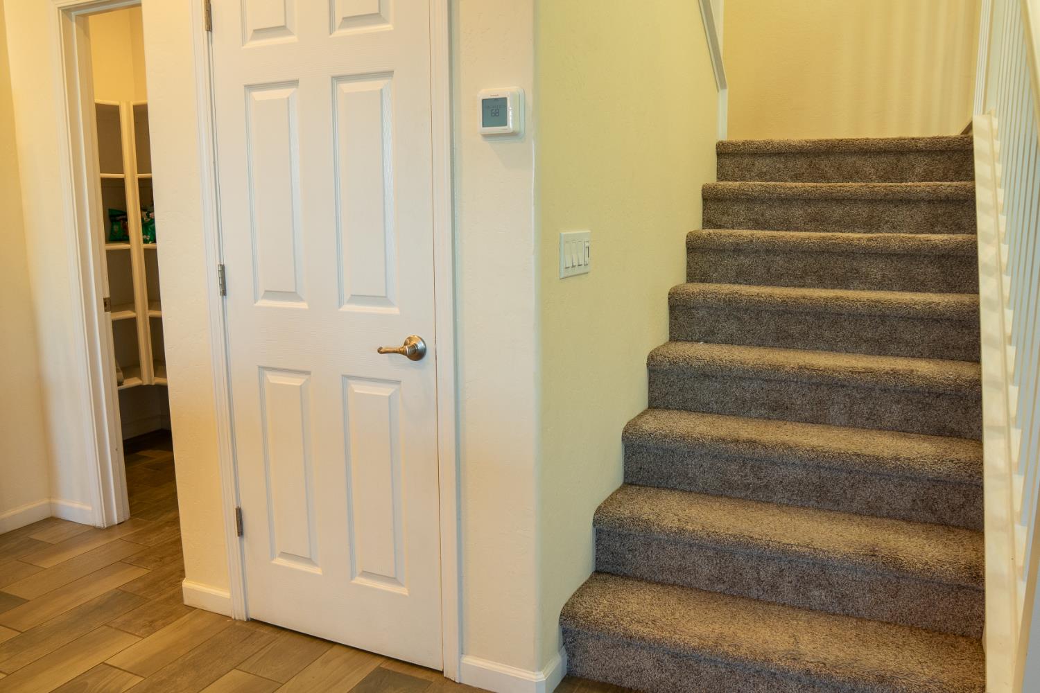 470 Daphne Lane Lemoore, CA 93245 - Photo 78 of 86 a view of staircase with white walls