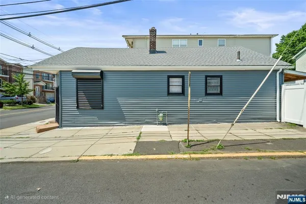 a view of a house with a street