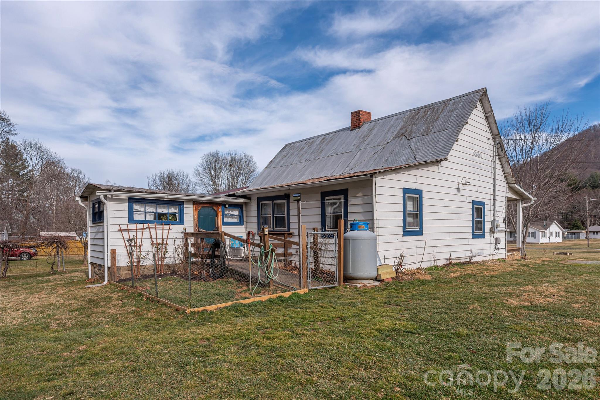 1496 Allens Creek Road Waynesville, NC 28786 - Photo 15 of 25 a view of a house with a yard