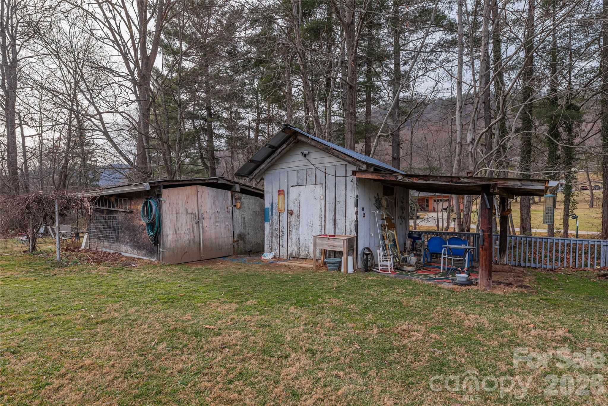 1496 Allens Creek Road Waynesville, NC 28786 - Photo 17 of 25 a front view of a house with a yard