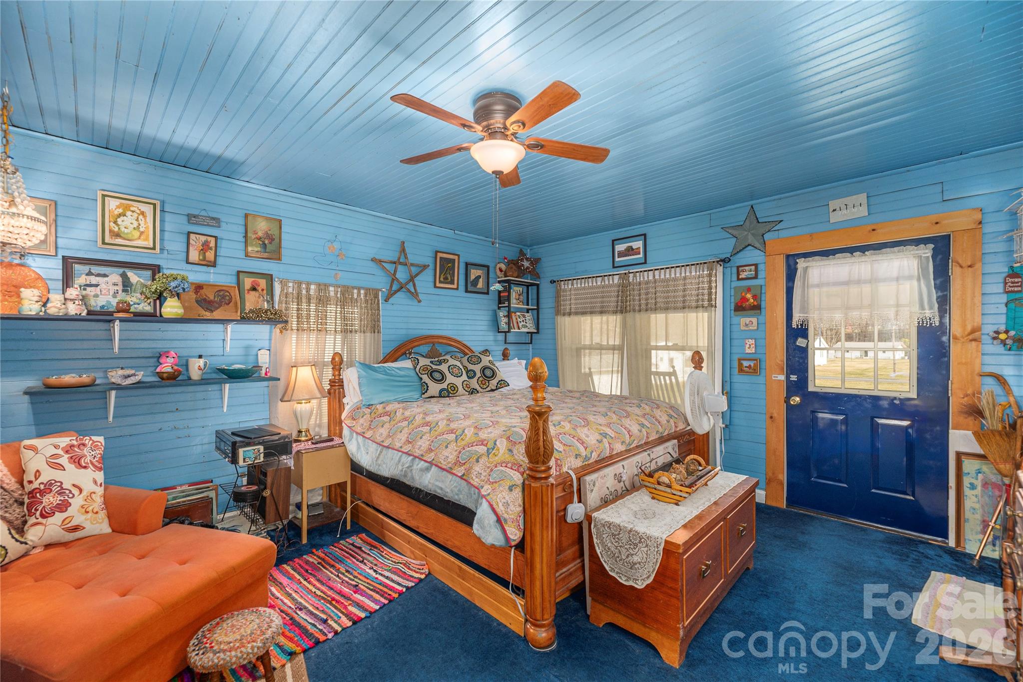 1496 Allens Creek Road Waynesville, NC 28786 - Photo 9 of 25 a bedroom with bed and window