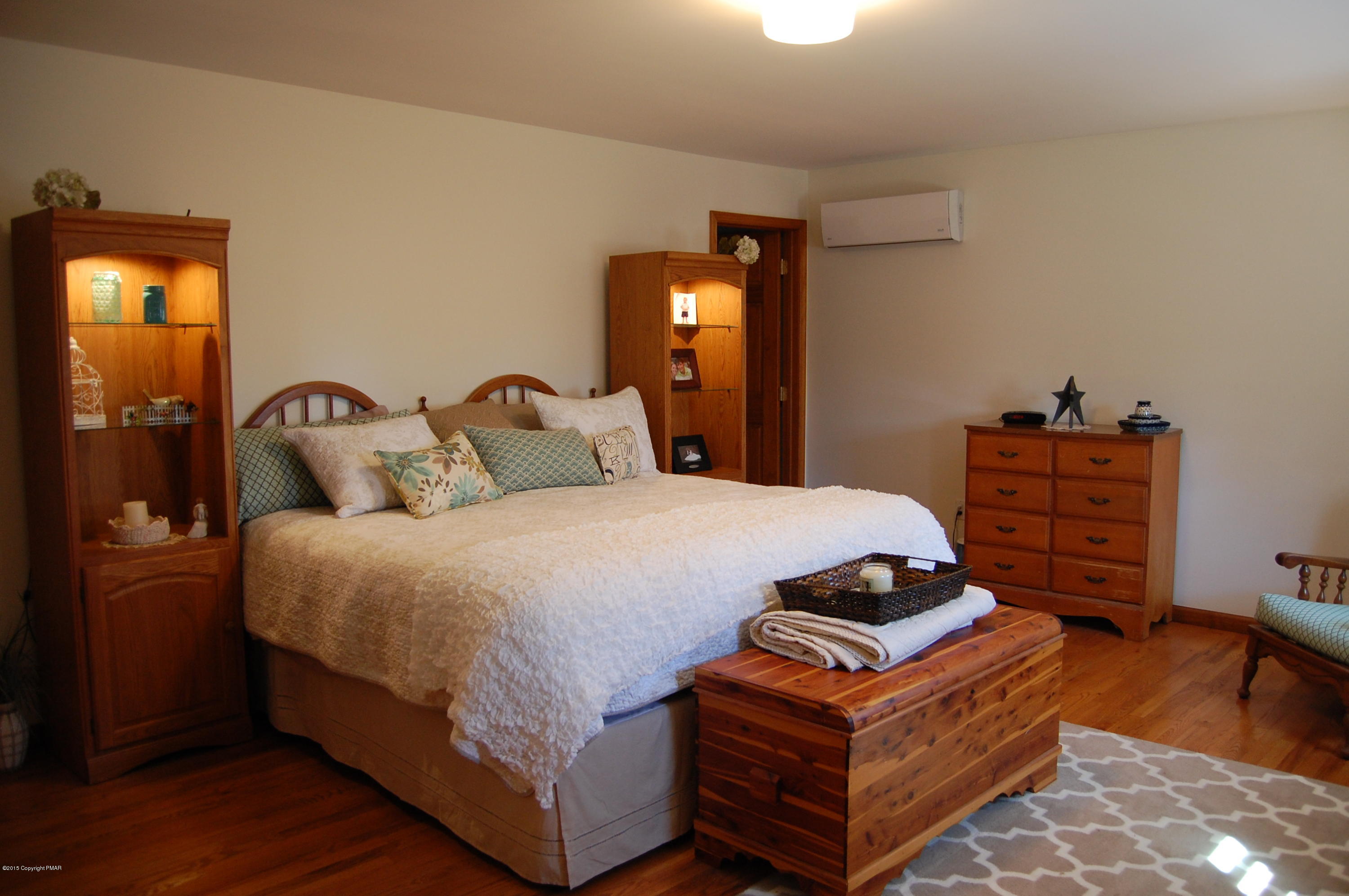 201 Grange Road Mount Pocono, PA 18344 - Photo 11 of 27 a bedroom with a bed and dresser