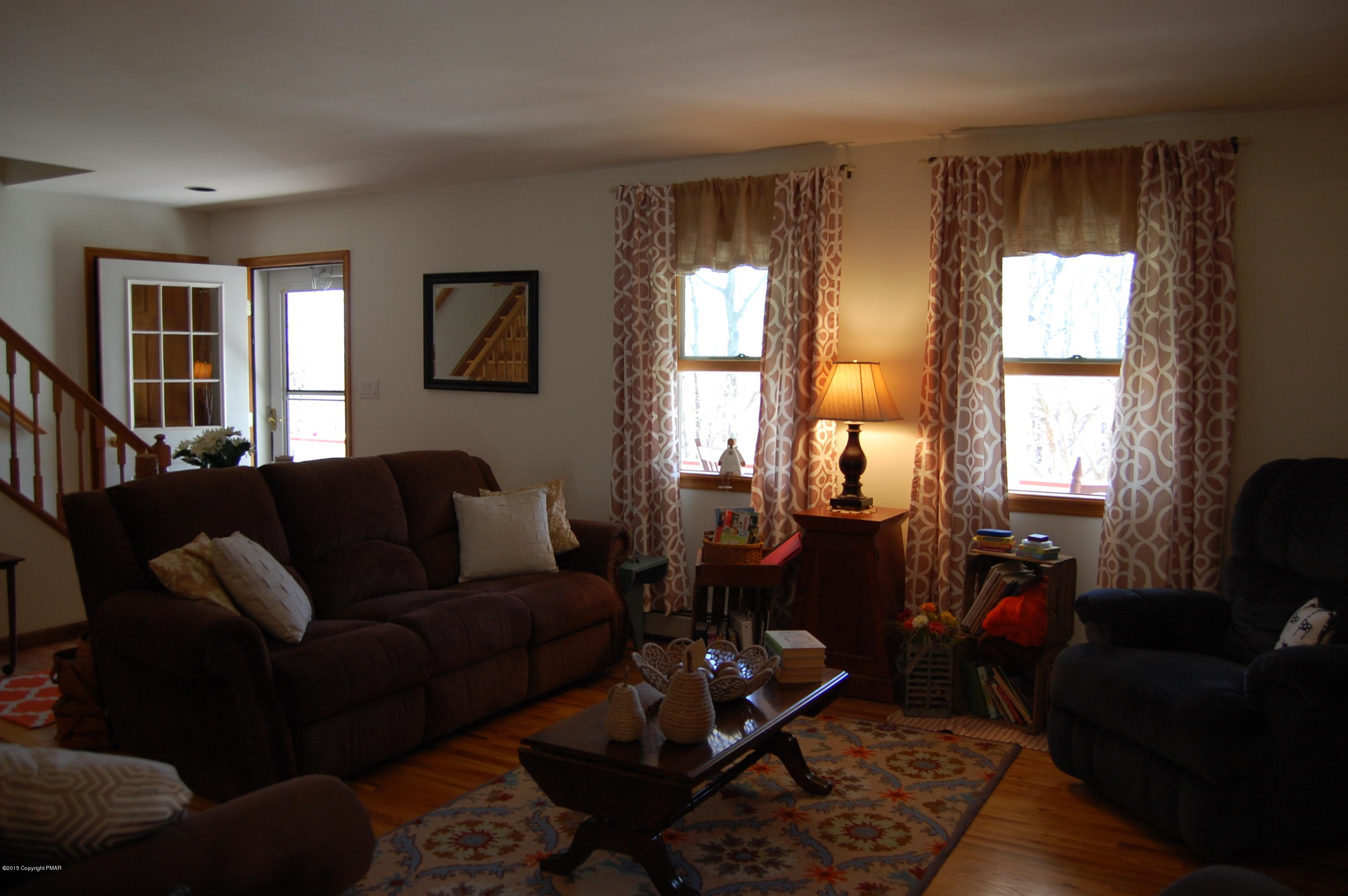 201 Grange Road Mount Pocono, PA 18344 - Photo 5 of 27 a living room with furniture window and wooden floor