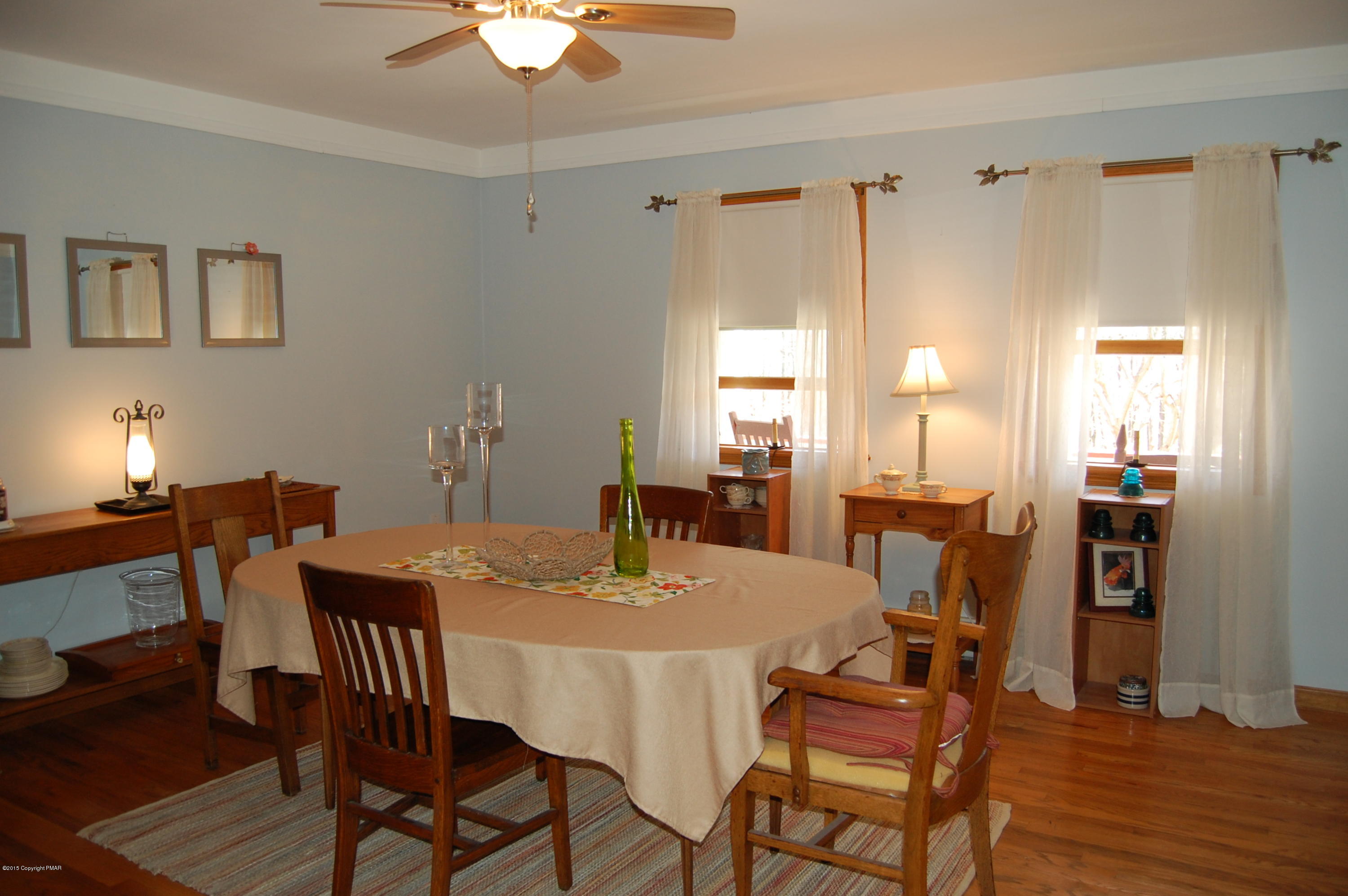 201 Grange Road Mount Pocono, PA 18344 - Photo 9 of 27 a view of a dining room with furniture and wooden floor