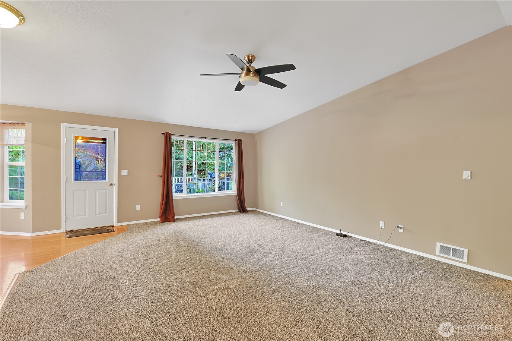 17538 Loop Lane Southeast Yelm, WA 98597 - Photo 4 of 20 an empty room with windows