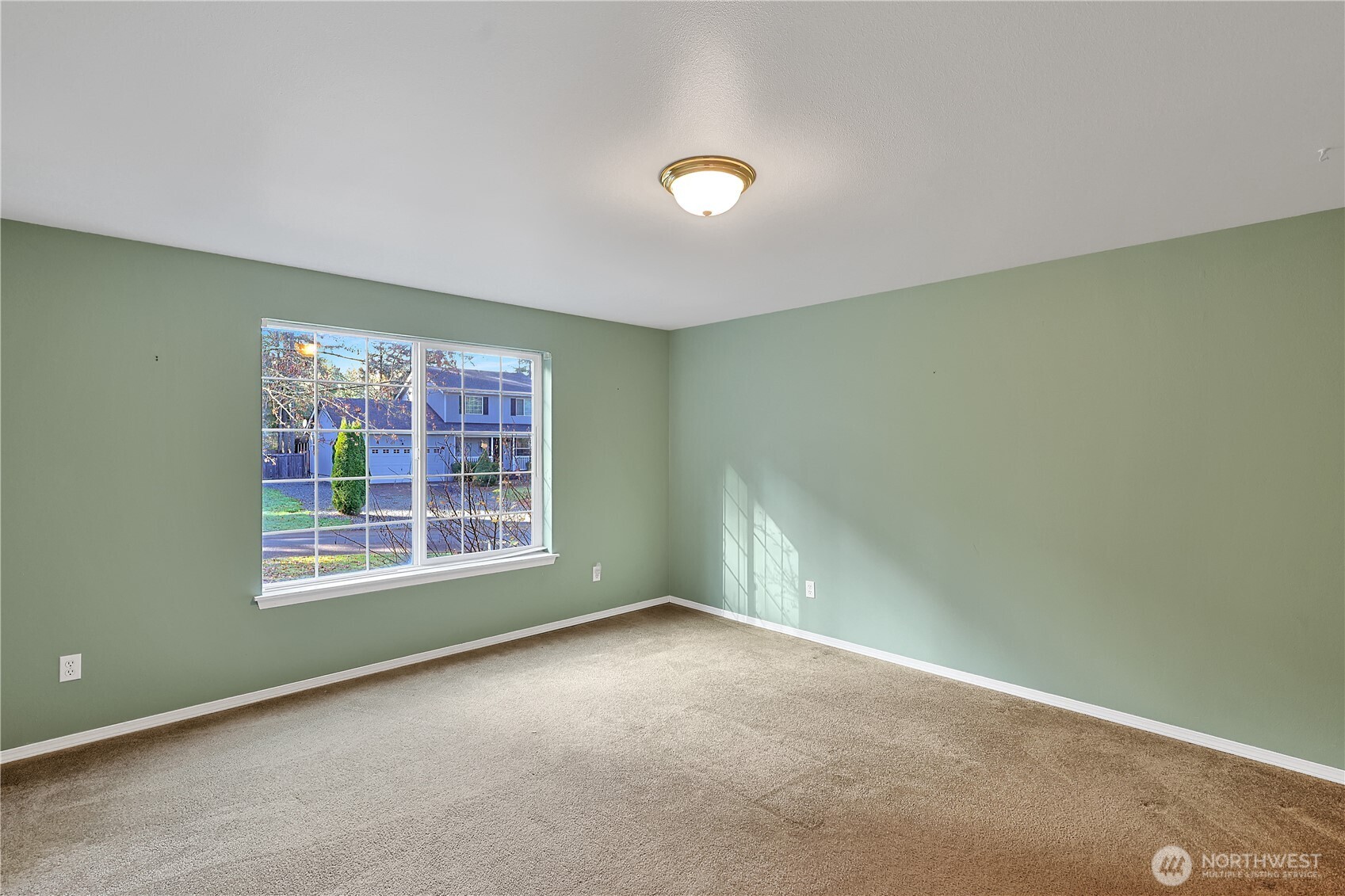 17538 Loop Lane Southeast Yelm, WA 98597 - Photo 5 of 20 an empty room with a window