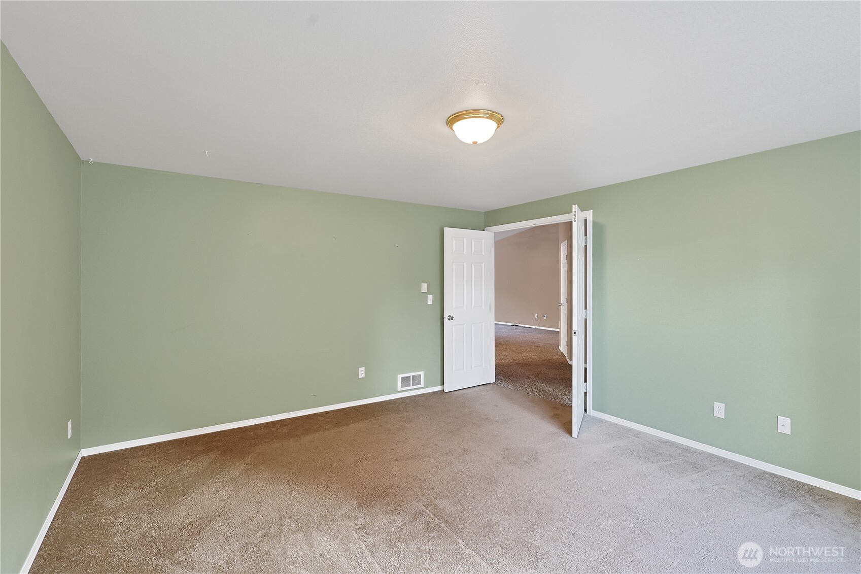 17538 Loop Lane Southeast Yelm, WA 98597 - Photo 6 of 20 an empty room with closet and a window
