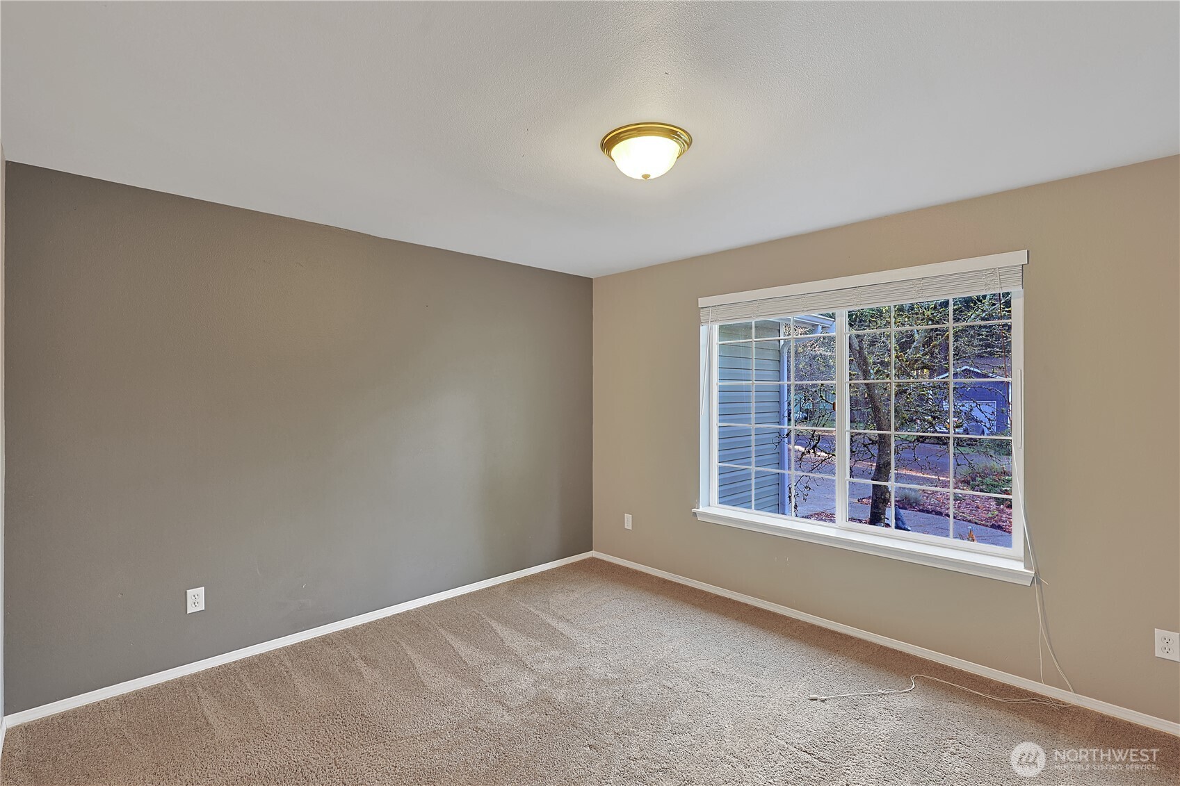17538 Loop Lane Southeast Yelm, WA 98597 - Photo 7 of 20 an empty room with windows