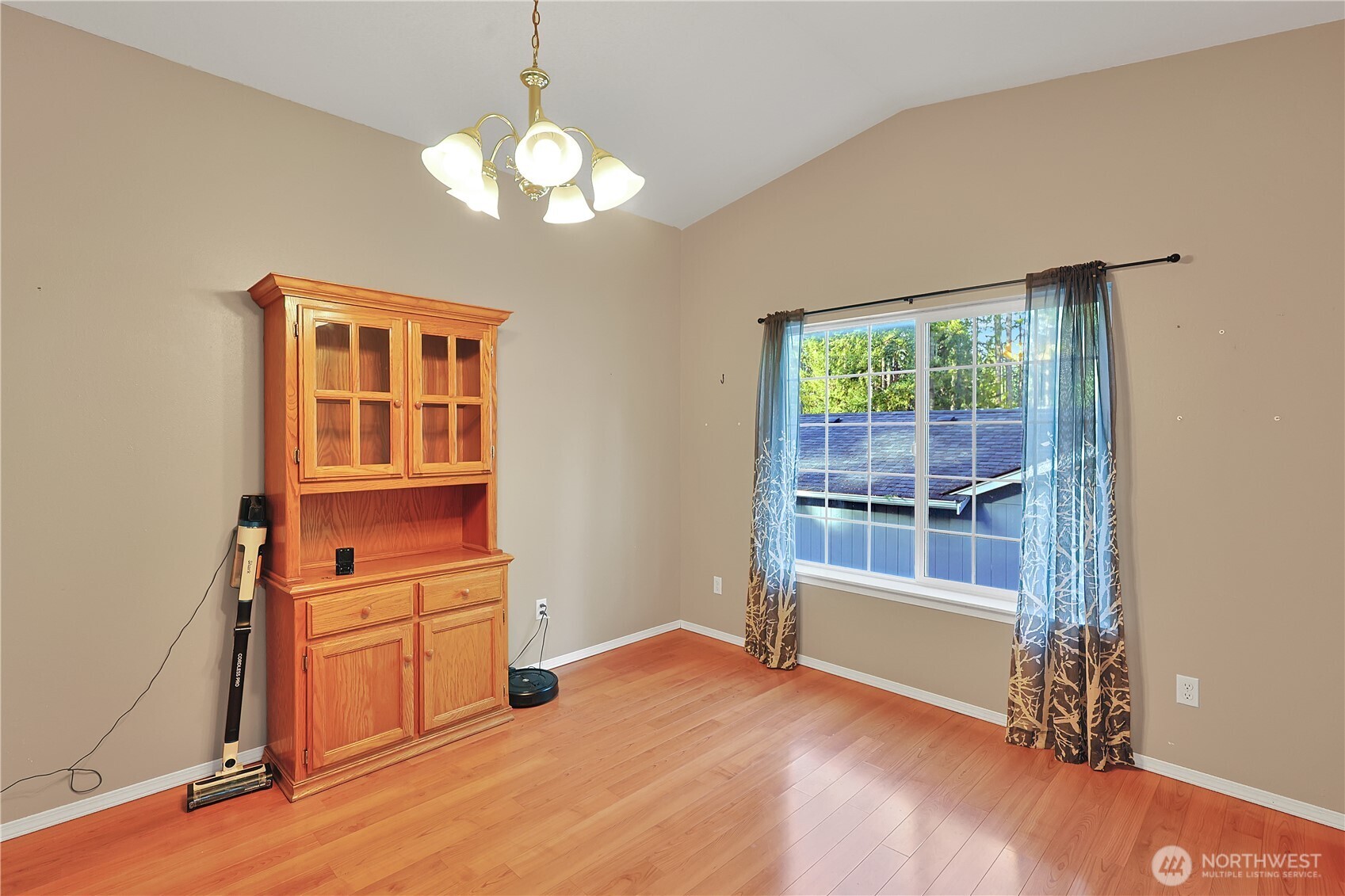 17538 Loop Lane Southeast Yelm, WA 98597 - Photo 10 of 20 wooden floor in an empty room with a window