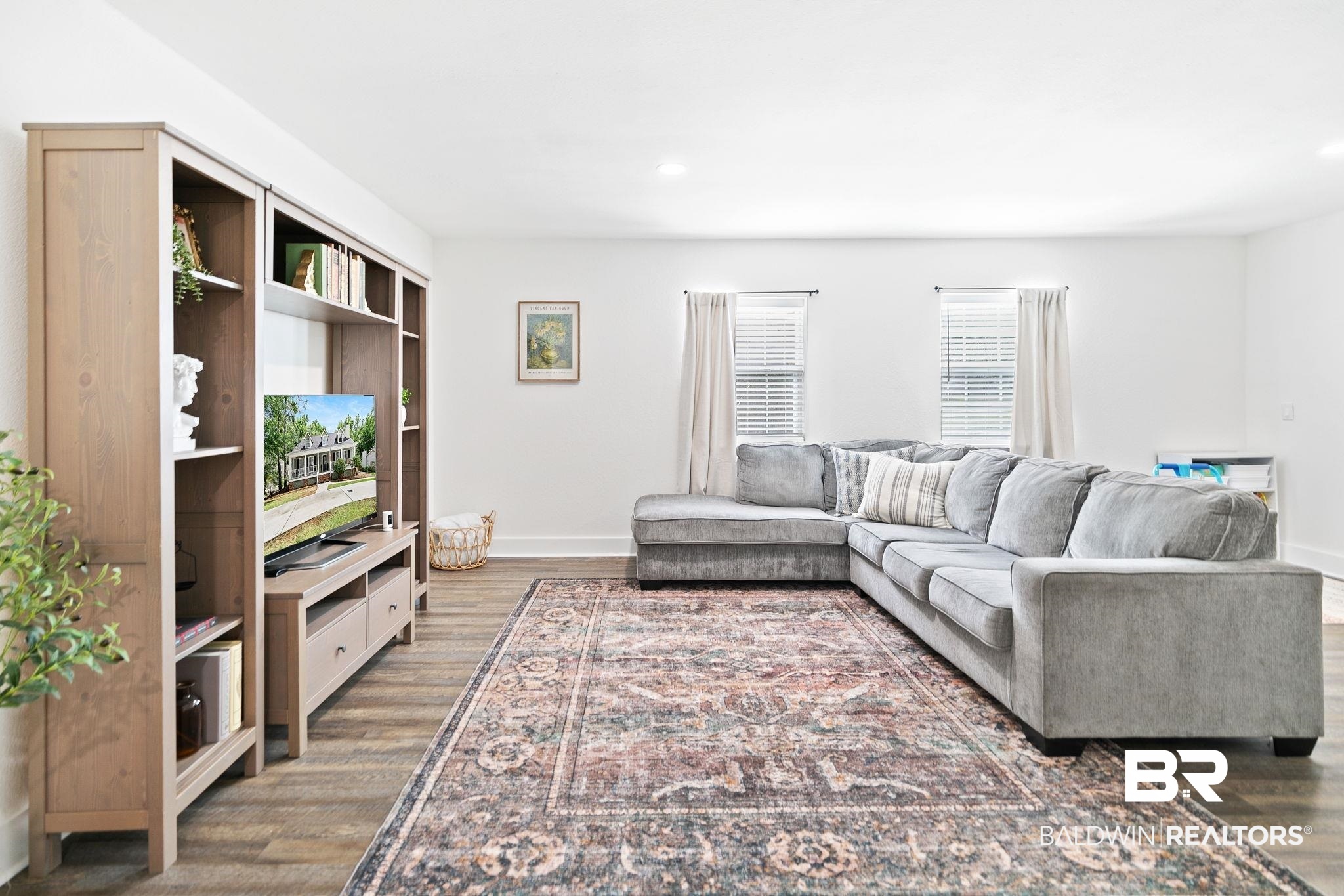 342 Ridgewood Drive Daphne, AL 36526 - Photo 24 of 36 Living room with dark hardwood / wood-style flooring