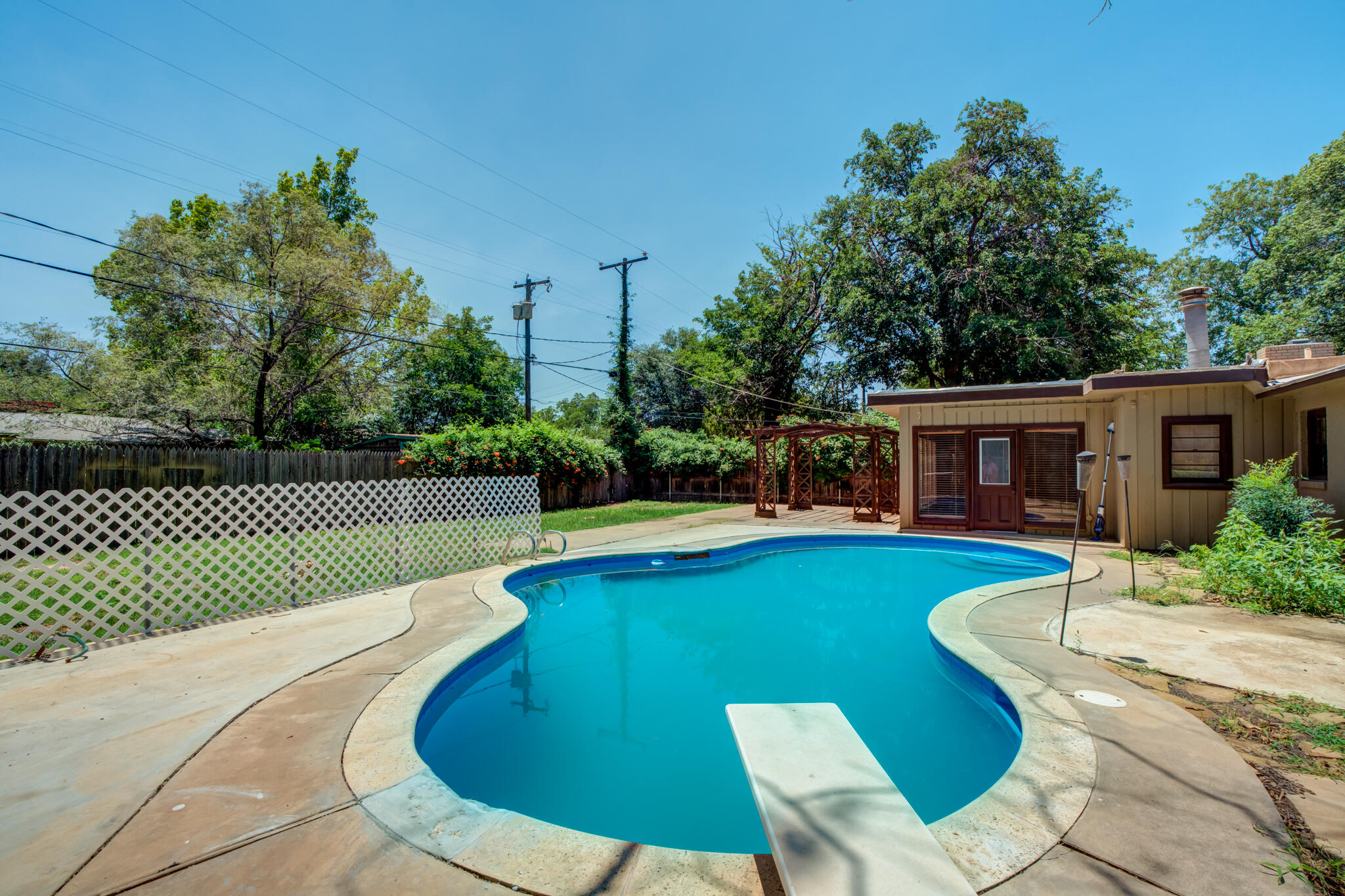 a view of a house with a swimming pool
