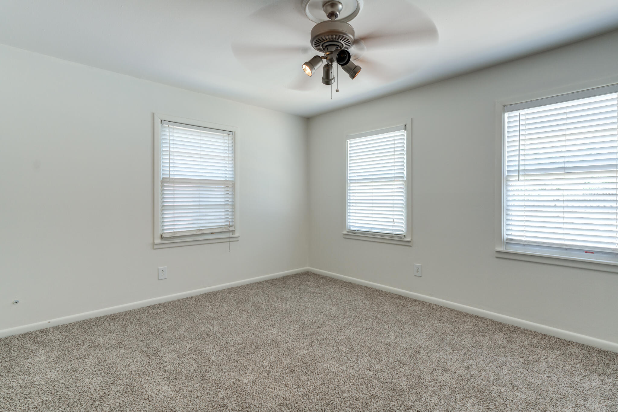 3511 44th Street Lubbock, TX 79413 - Photo 17 of 24 a view of a livingroom with a window