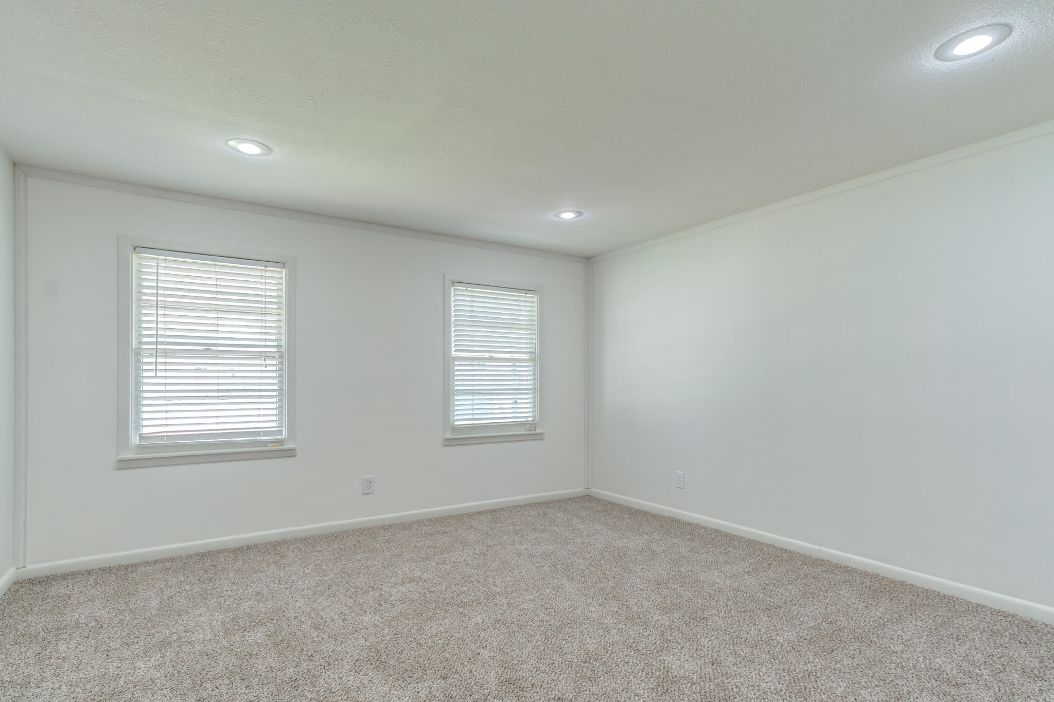 3511 44th Street Lubbock, TX 79413 - Photo 18 of 24 an empty room with windows
