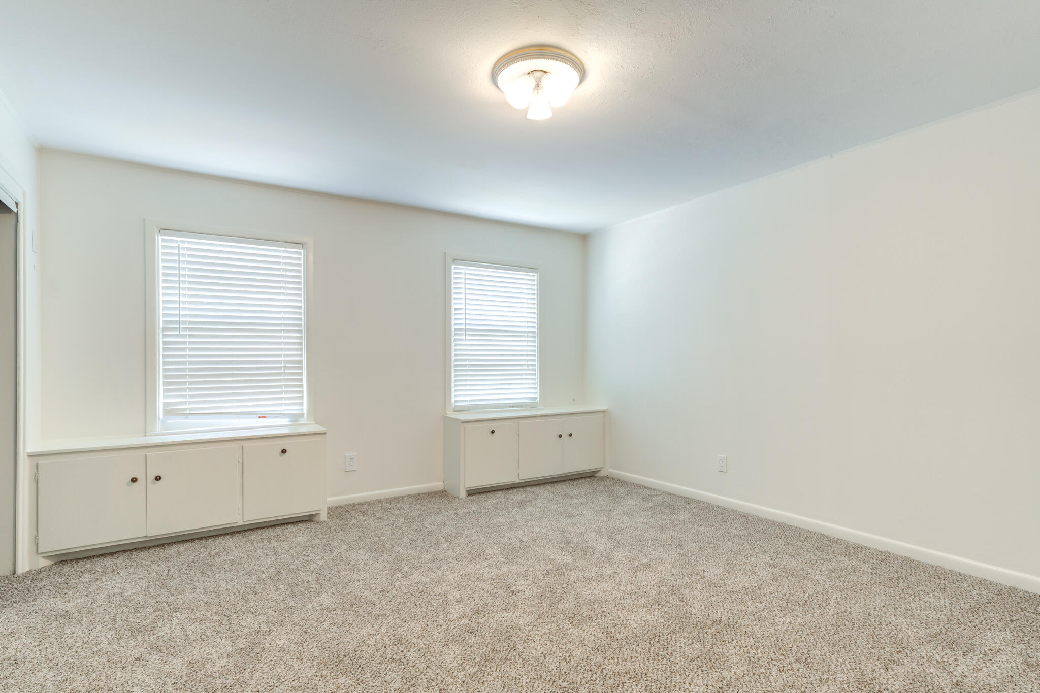 3511 44th Street Lubbock, TX 79413 - Photo 19 of 24 an empty room with a window