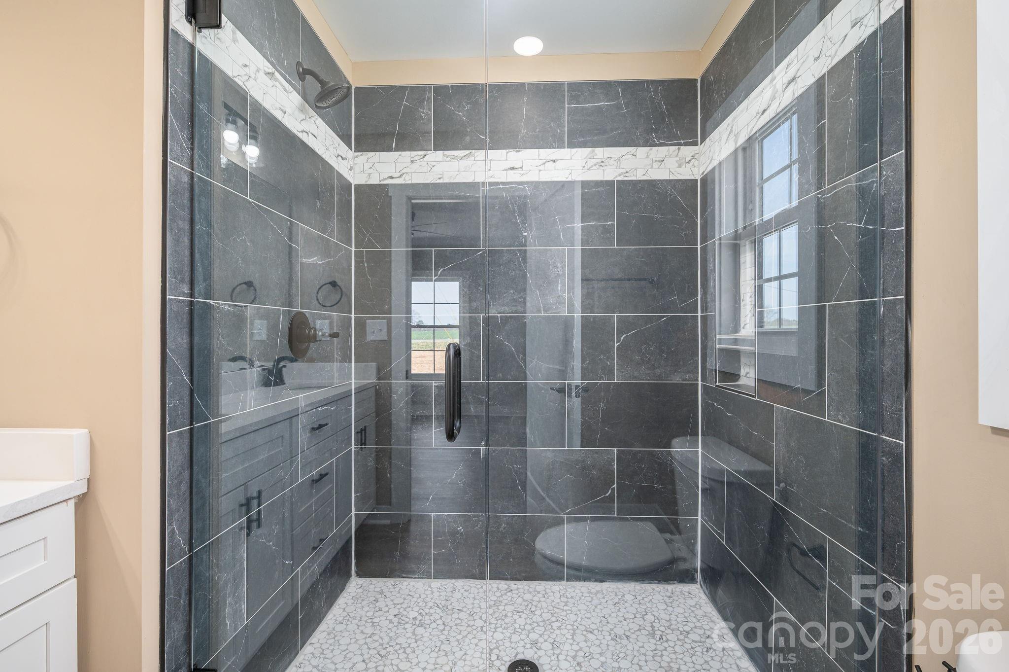 347 Old Belwood Road Lawndale, NC 28090 - Photo 21 of 31 a bathroom with a shower