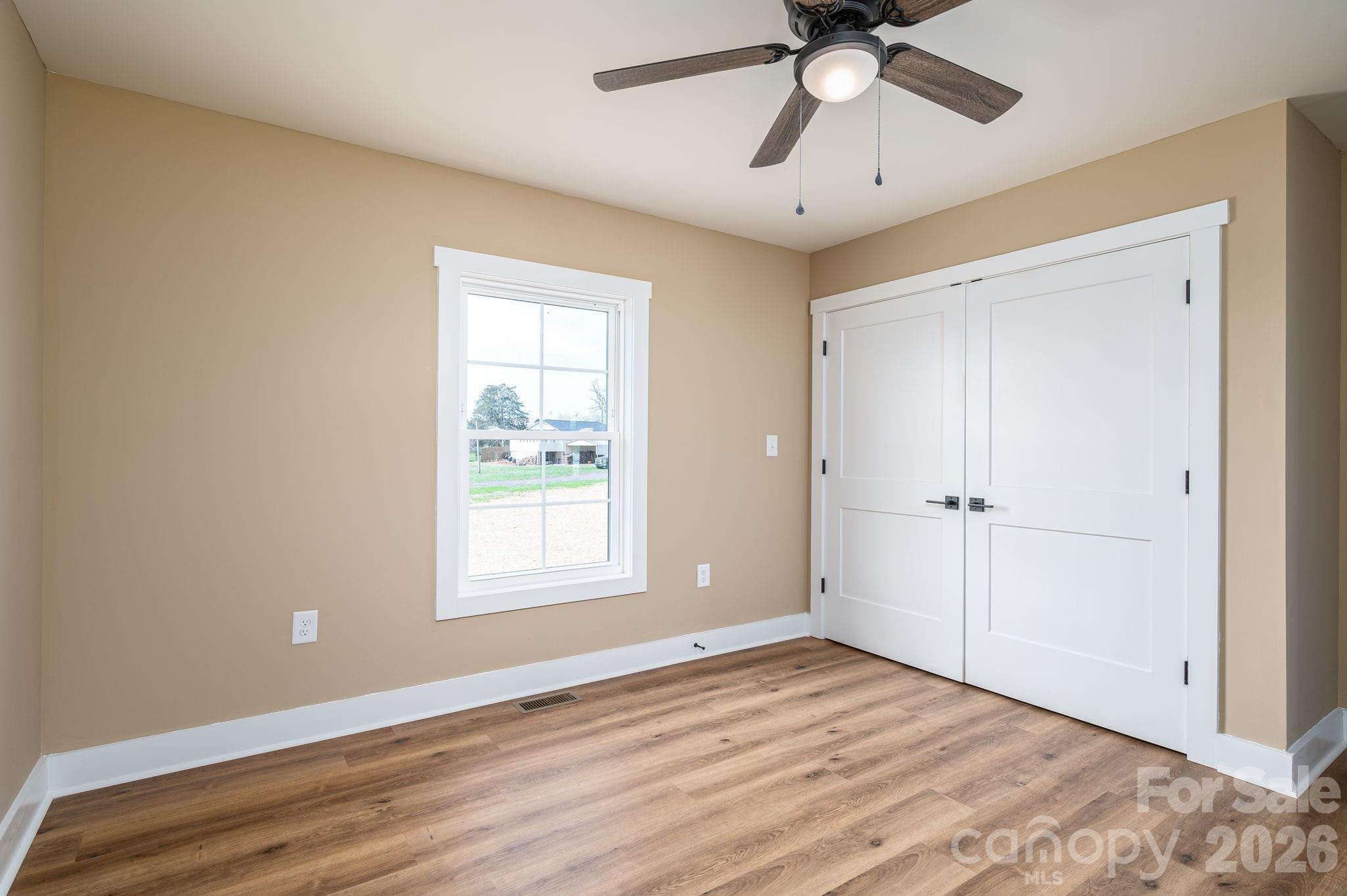 347 Old Belwood Road Lawndale, NC 28090 - Photo 24 of 31 a view of an empty room with a window