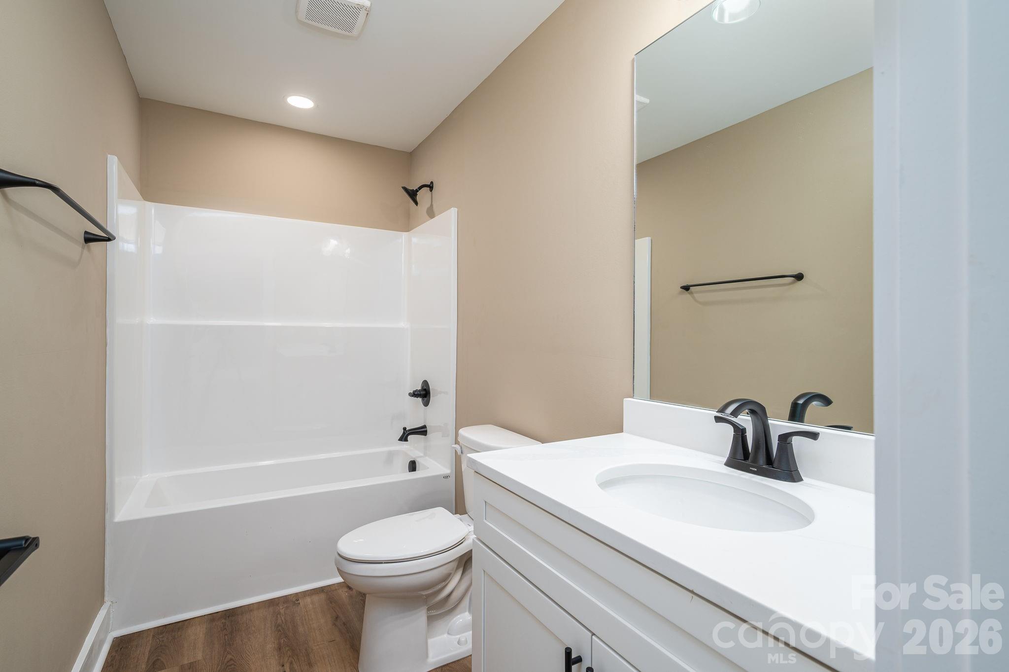 347 Old Belwood Road Lawndale, NC 28090 - Photo 27 of 31 a bathroom with a sink toilet and shower
