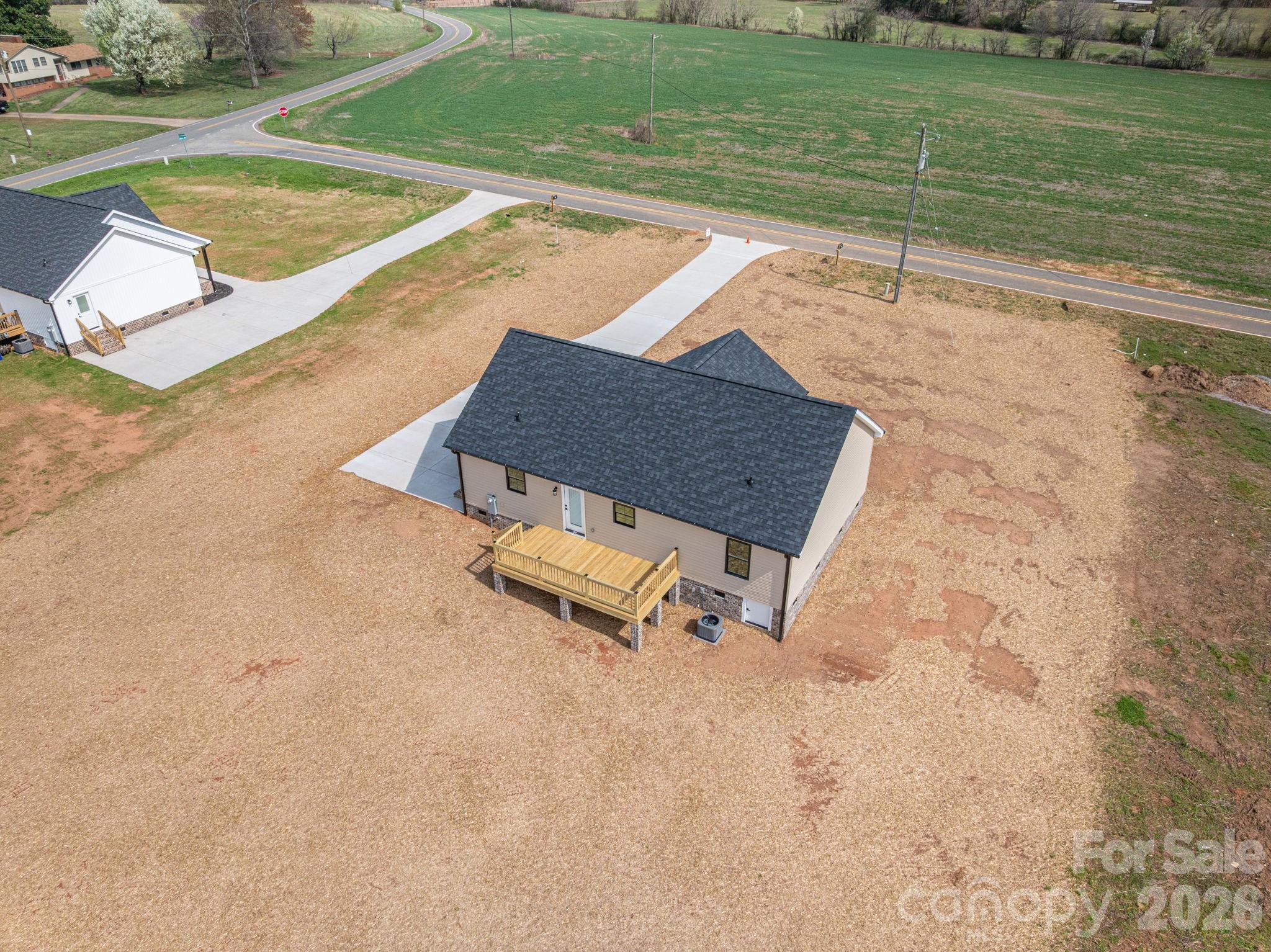 347 Old Belwood Road Lawndale, NC 28090 - Photo 7 of 31 swimming pool view with a garden