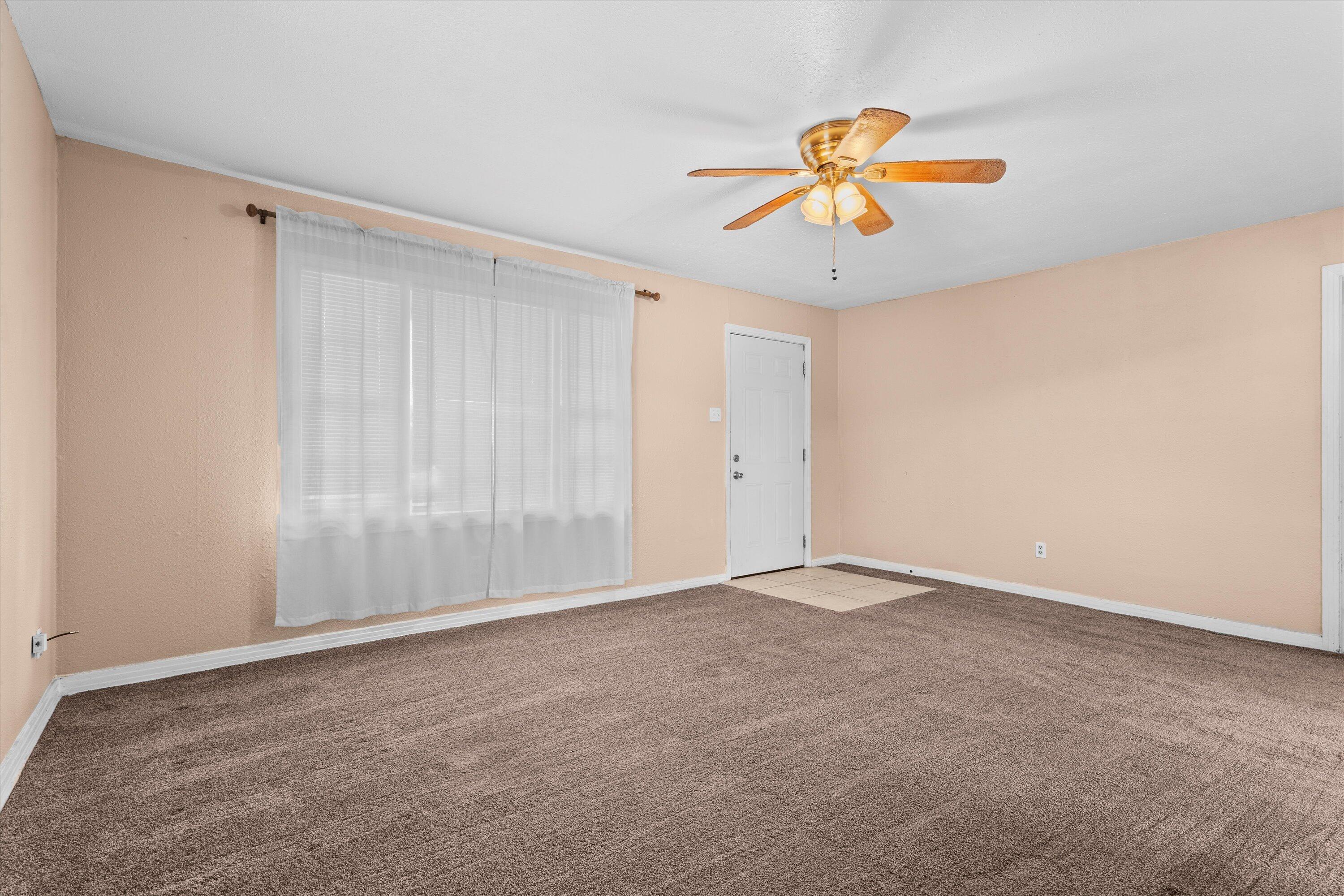 4315 33rd Street Lubbock, TX 79410 - Photo 3 of 16 a view of an empty room