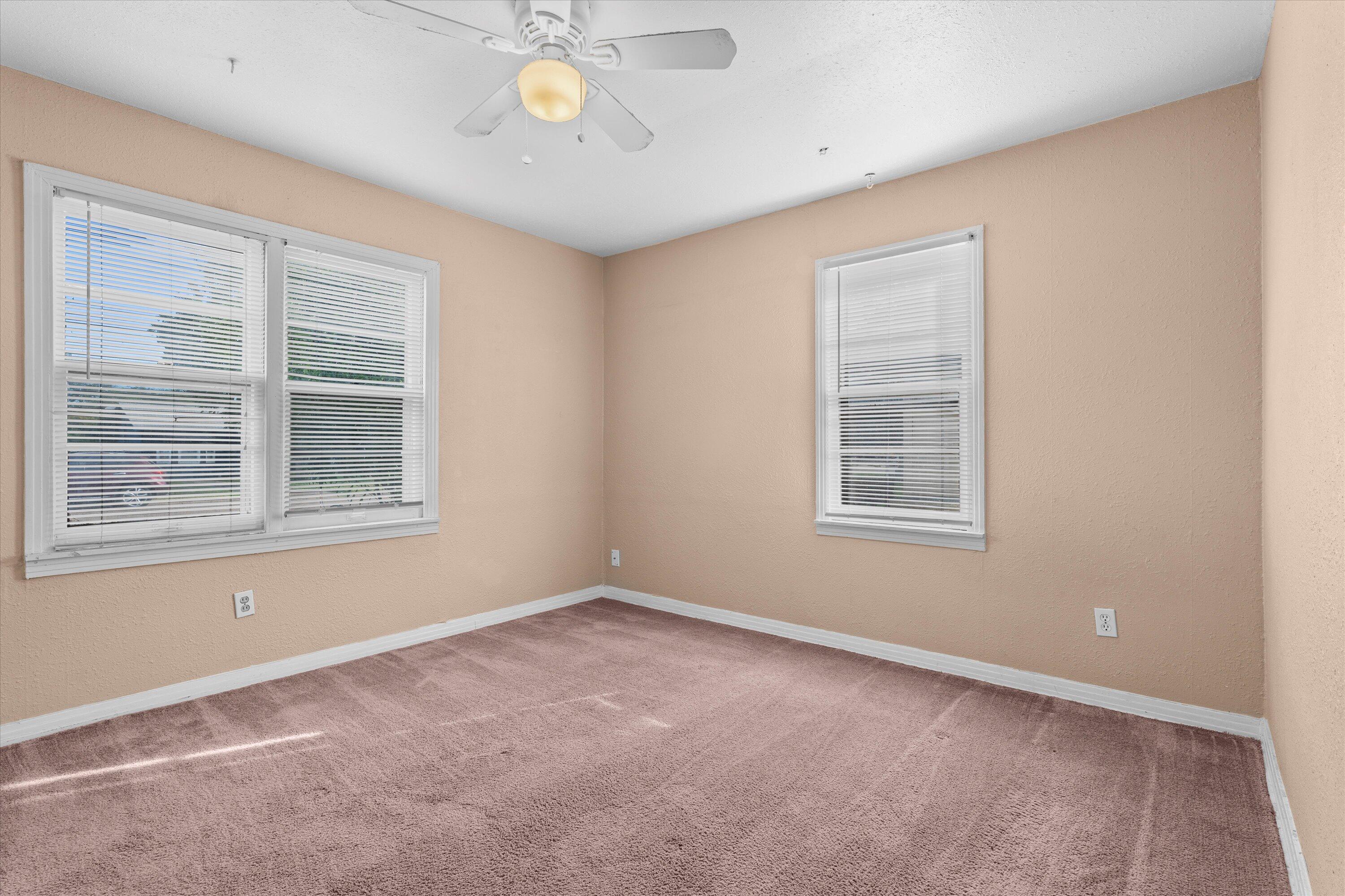 4315 33rd Street Lubbock, TX 79410 - Photo 10 of 16 an empty room with a window