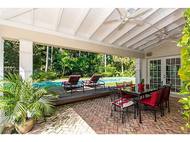 611 Sabal Palm Road Miami, FL 33137 - Photo 21 of 34 a living room filled with furniture and a large window