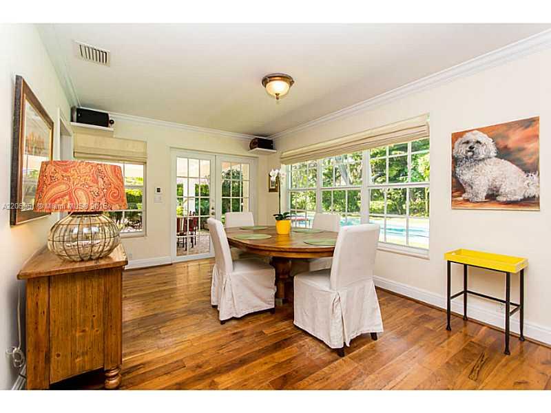 611 Sabal Palm Road Miami, FL 33137 - Photo 5 of 34 a living room with furniture and a large window