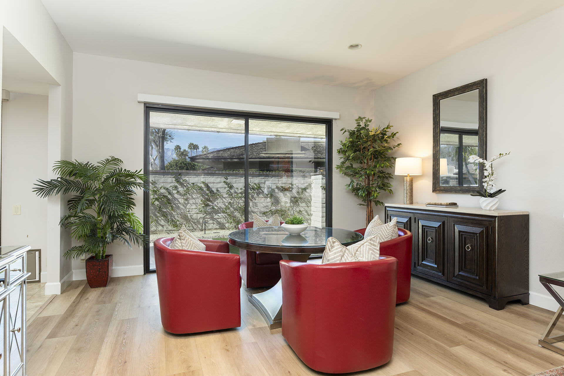 32 Colgate Drive Rancho Mirage, CA 92270 - Photo 15 of 51 a living room with furniture and a potted plant