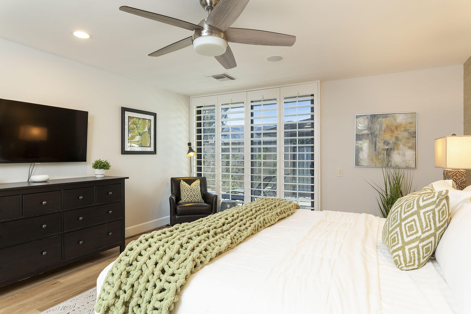 32 Colgate Drive Rancho Mirage, CA 92270 - Photo 25 of 51 a bedroom with a bed and a flat screen tv