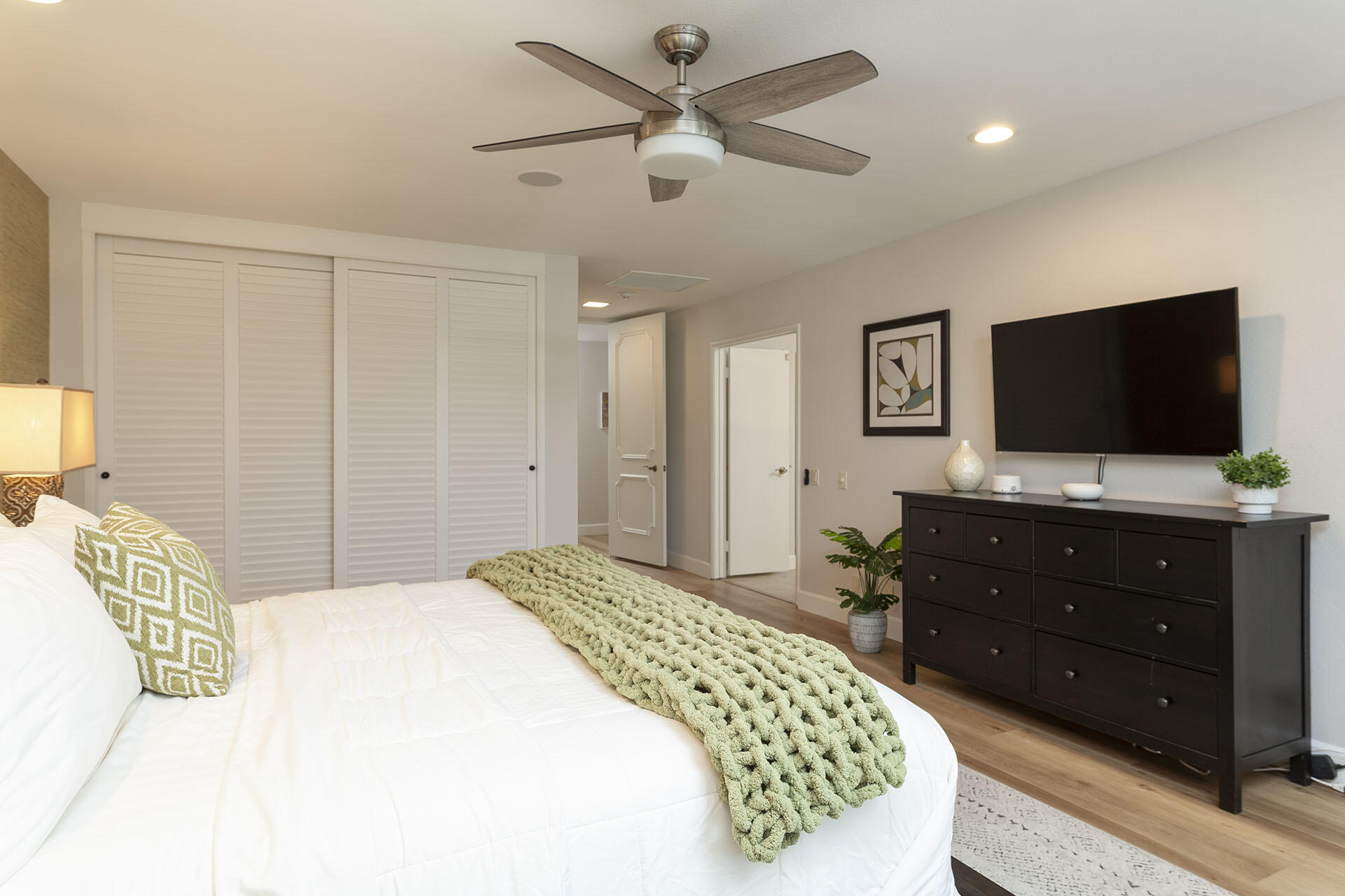 32 Colgate Drive Rancho Mirage, CA 92270 - Photo 26 of 51 a bedroom with a bed and a flat screen tv