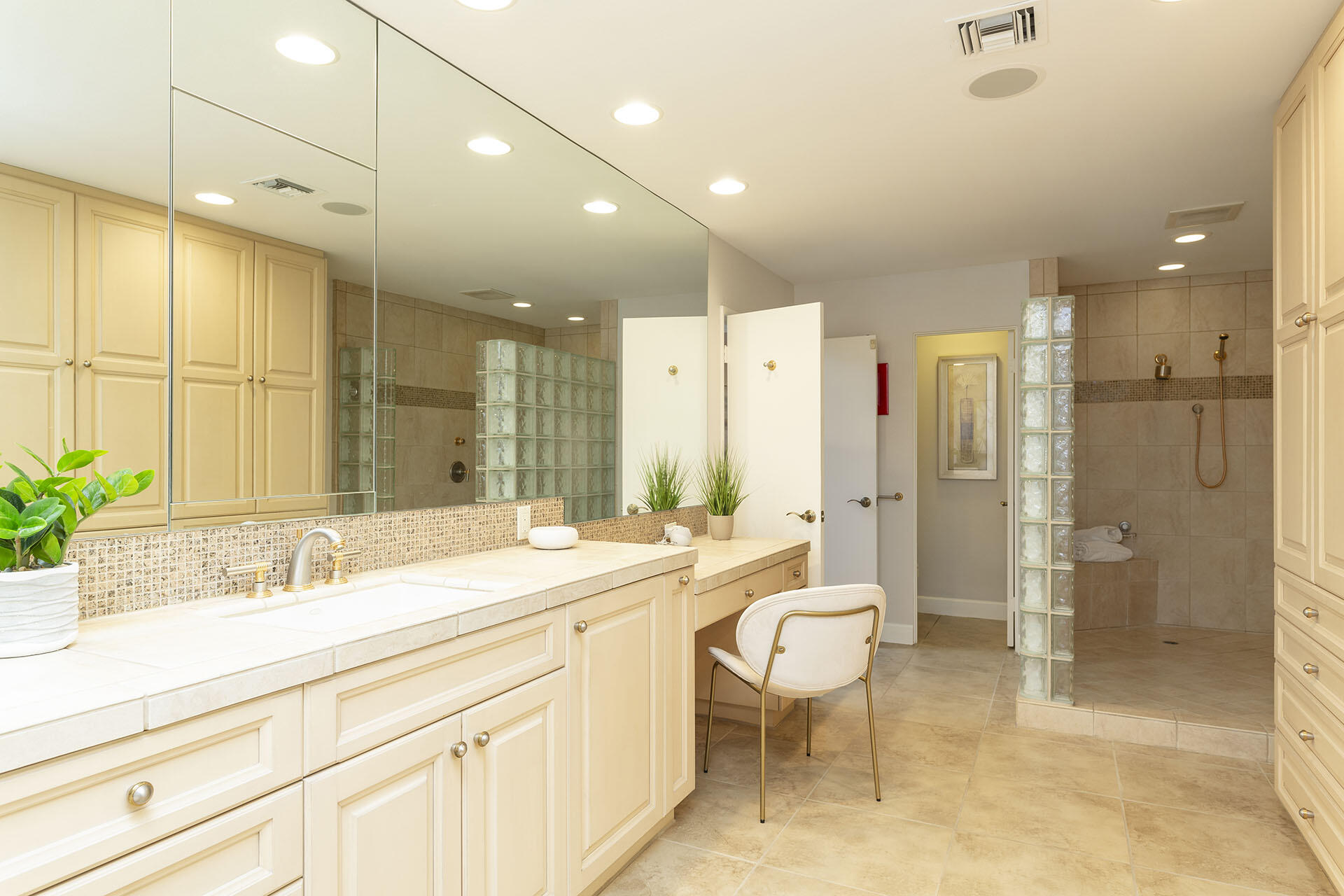 32 Colgate Drive Rancho Mirage, CA 92270 - Photo 29 of 51 a bathroom with a double vanity sink toilet and shower