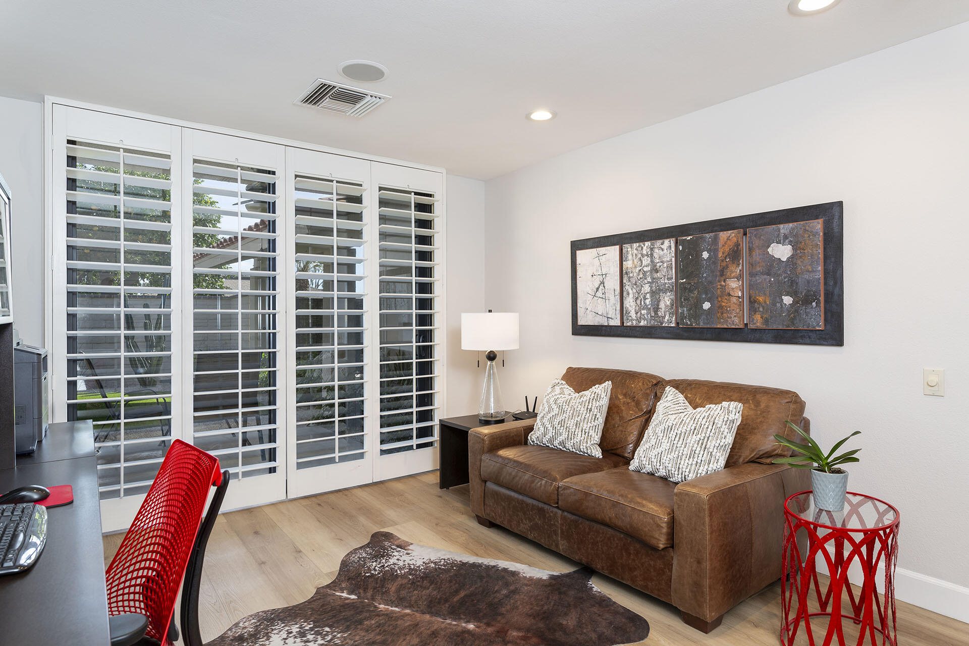32 Colgate Drive Rancho Mirage, CA 92270 - Photo 32 of 51 a living room with furniture and a large window
