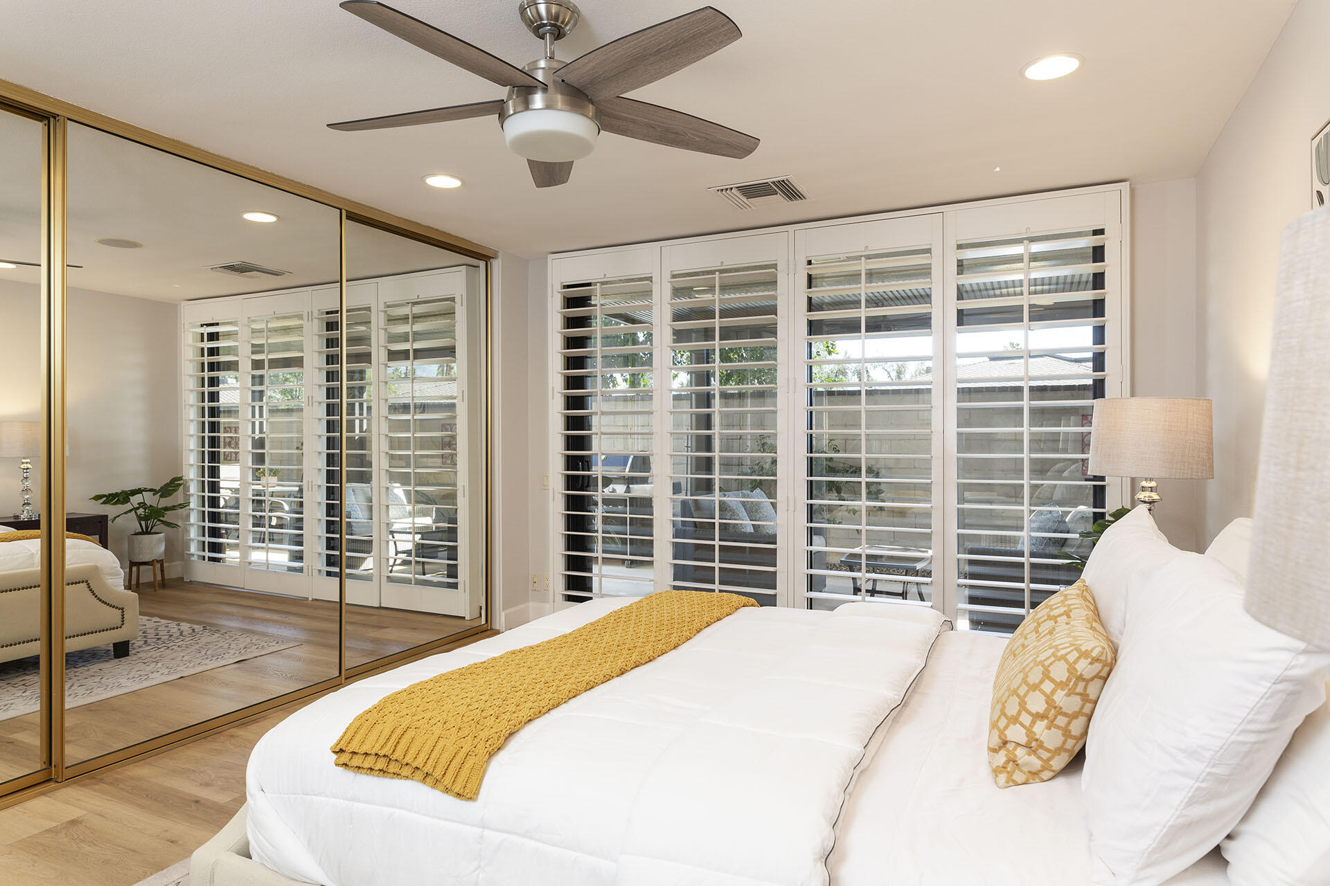 32 Colgate Drive Rancho Mirage, CA 92270 - Photo 36 of 51 a bedroom with a large bed and a large window
